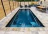 Fiberglass lap pool installation for backyard fitness